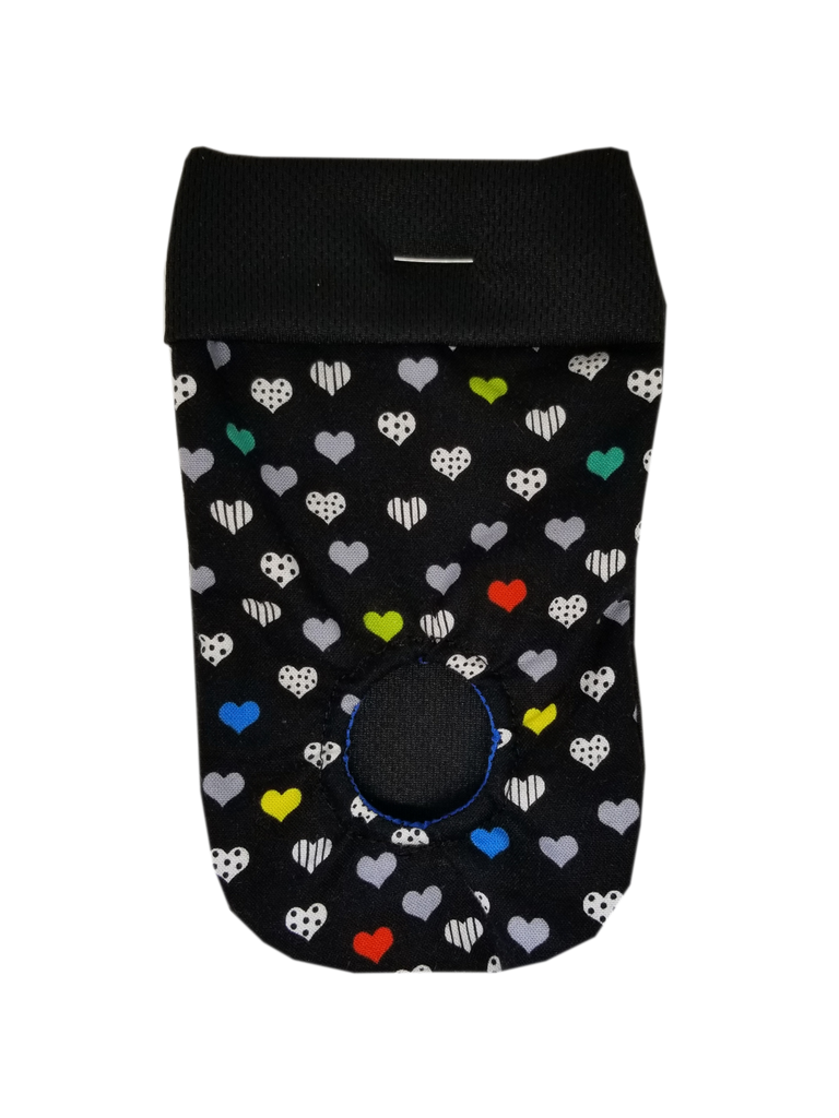 packing pouch for FTM, transmasculine and non-binary people. Joeys hold your packer in place. Colourful and patterned hearts on a black background.