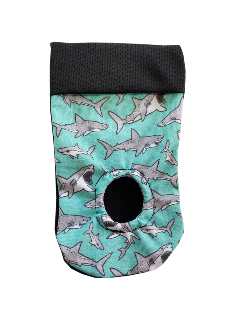 Grey sharks on a mint background. packing pouch for FTM, transmasculine and non-binary people. Joeys hold your packer in place.