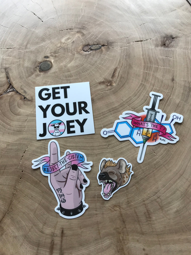 Four pack of stickers.  First has the Get Your Joey logo, second is a hand with a banner that says Reject the Cistem, Third is a Hyeena, a gender outlier animal, and the fourth is of a needle and chemical representation of testosterone that says What's the T? Vinyl stickers.