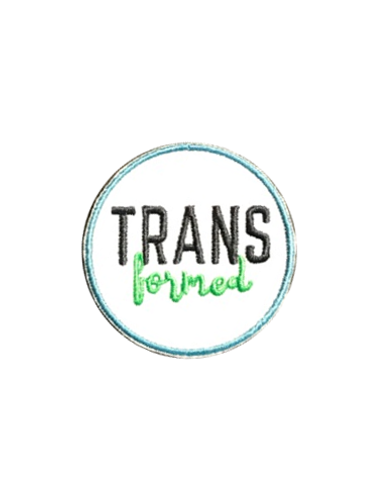 circular patch for FTM and trans people that says transformed over a white background