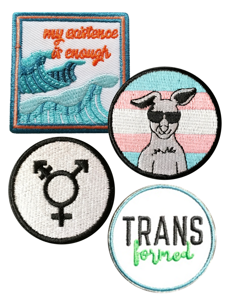 one square patch © Meg Lee @megemikoart My Existence is Enough -  A blue and orange design with crashing waves and cursive text that reads "my existence is enough", and Three round patches. Top patch is smiling kangaroo with sunglasses over a trans flag. Second is a white patch with a blue border that says Trans in bold black font and formed in smaller green cursive. Bottom is the black non binary symbol on a white background.