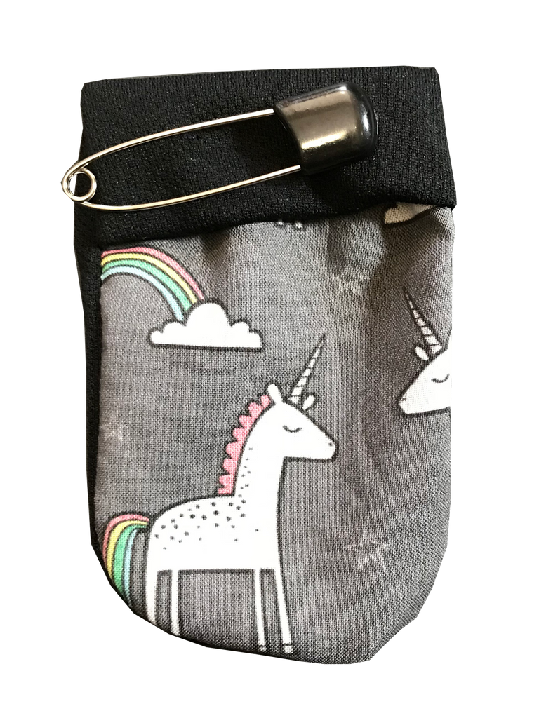 White unicorns with pink manes, and rainbows on a grey background.
